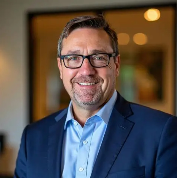 Headshot of John Baker, CEO